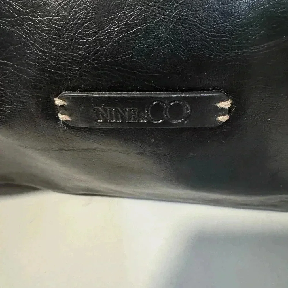 Nine  and Co  black leathe purse